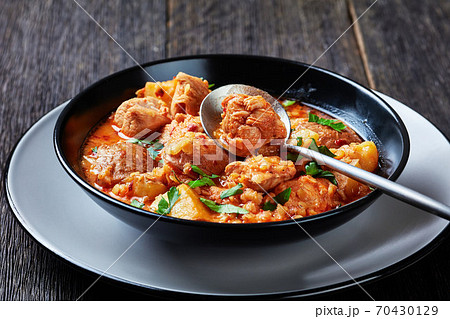 chicken arrabbiata stew with lentil and potato 70430129