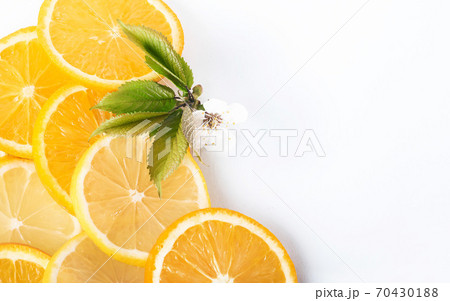 slices of orange and lemon isolated on a white background slices of orange and lemon isolated on a white background 70430188