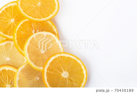 slices of orange and lemon isolated on a white background 70430189