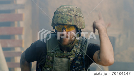 Dead soldier on battlefield during war Dead soldier on battlefield during war 70434147