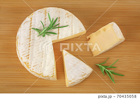 Camembert cheese on wooden background with full depth of field. Top view. Flat lay Camembert cheese on wooden background with full depth of field. Top view. Flat lay 70435058