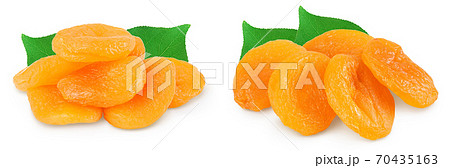 Dried apricots isolated on white background with clipping path and full depth of field. Dried apricots isolated on white background with clipping path and full depth of field. 70435163