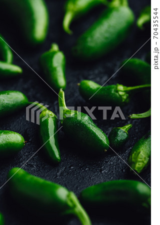 Jalapeno Peppers on Concrete Background 70435544