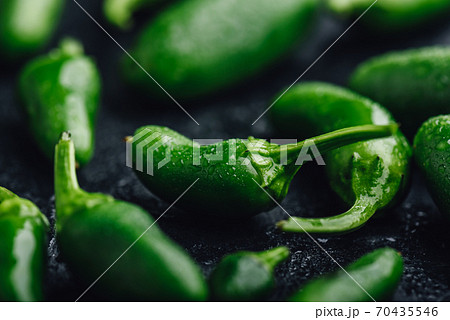 Ripe Jalapeno Peppers on Concrete Backdrop Ripe Jalapeno Peppers on Concrete Backdrop 70435546