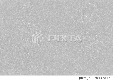 ざらざらナチュラルなグレーの紙素材の写真素材