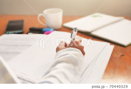 Woman working at home office workspace. Woman working at home office workspace. 70440329