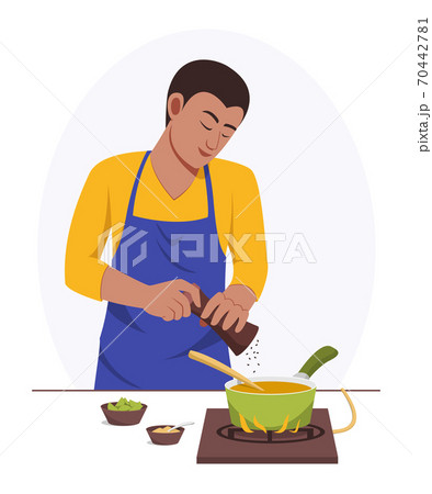 Man is Cooking at Home by Himself. Man is Cooking at Home by Himself. 70442781