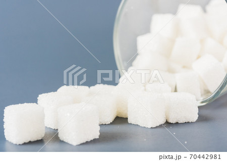 sugar cube sweet food ingredient spilled out of the glass sugar cube sweet food ingredient spilled out of the glass 70442981