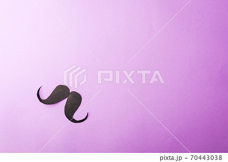 Black mustache paper on purple 70443038