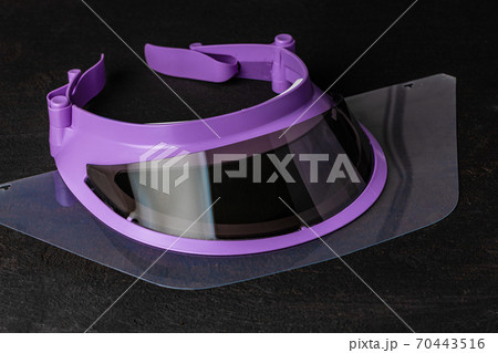 Medical protective visor, plastic face shield close up Medical protective visor, plastic face shield close up 70443516