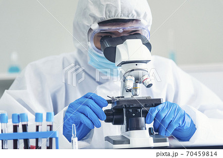 Male Scientist look into Microscope research in science laboratory. Asian scientist equipment Male Scientist look into Microscope research in science laboratory. Asian scientist equipment 70459814