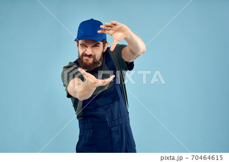 Man in working uniform emotions in life delivery service work 70464615