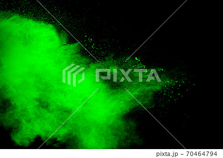 Green powder explosion cloud on black background. Green powder explosion cloud on black background. 70464794