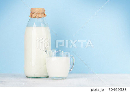 Milk in bottle and jug Milk in bottle and jug 70469583