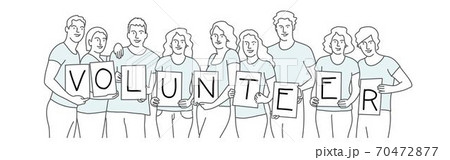 People Holding Boards with Volunteer 70472877