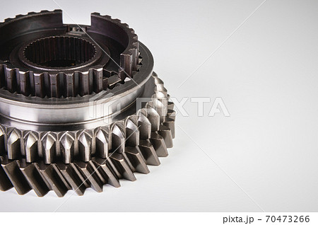 new gear for the gearbox. Mechanical background shiny detail new gear for the gearbox. Mechanical background shiny detail 70473266
