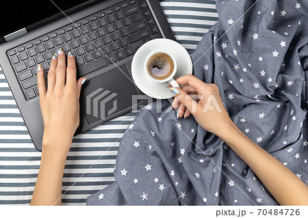 Flat lay top view workspace in cozy bedroom 70484726