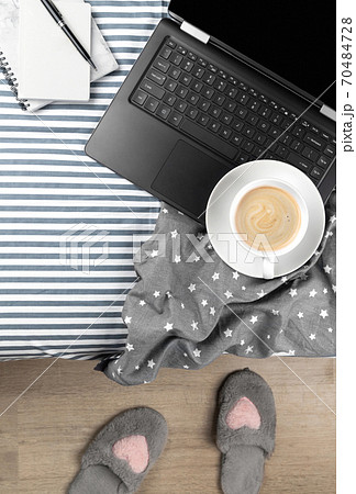 Flat lay top view workspace in cozy bedroom Flat lay top view workspace in cozy bedroom 70484728