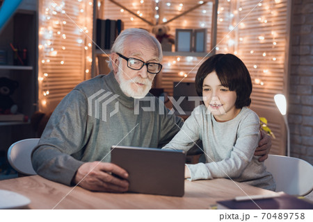 People are watching interesting movie.  70489758