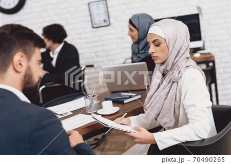 Disabled arab man in suit in wheelchair. Disabled arab man in suit in wheelchair. 70490265