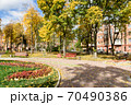 In the courtyard of stalinka building. Orange and green trees, Ukraine, Kharkov 70490386