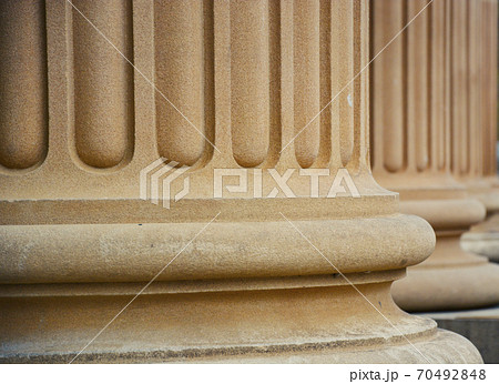 Ancient Pillars Made of Stone Showing Stability and Growth. Ancient Pillars Made of Stone Showing Stability and Growth. 70492848