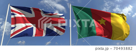 Waving flags of Great Britain and Cameroon on flagpoles, 3d rendering Waving flags of Great Britain and Cameroon on flagpoles, 3d rendering 70493882