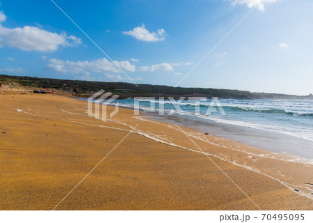 Golden sand in Porto Ferro beach 70495095