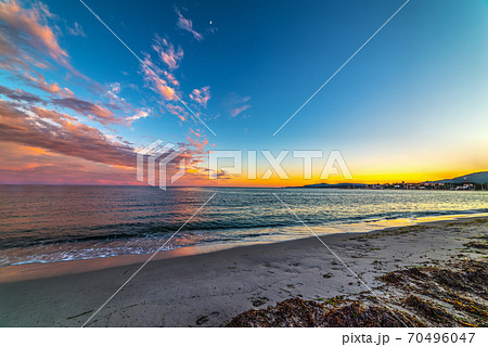 Colorful sunset in Alghero shore 70496047