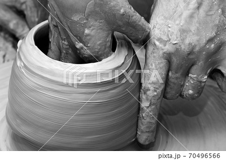 Process of making clayware on potter's wheel Process of making clayware on potter's wheel 70496566