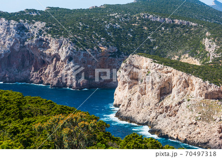 Rocky coastline in Capo Caccia Rocky coastline in Capo Caccia 70497318