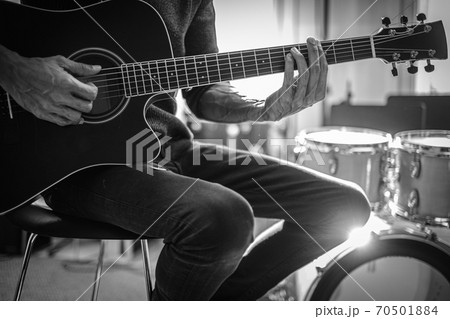 Man Hands Play Acoustic Guitar . Man Hands Play Acoustic Guitar . 70501884