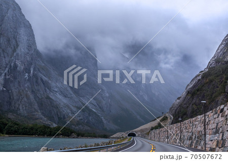Mountains road with tunnel near Andalsnes and Trollstigen in Norway 70507672