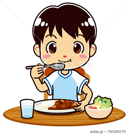 カレーとサラダを食べる男の子のイラスト素材