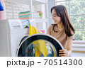 woman washing clothes 70514300