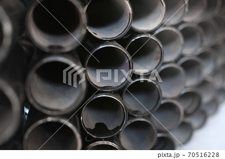 Black metal pipes for gasification or water supply. Industrial background close up 70516228