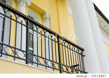 White building with columns in the classical style 70519807