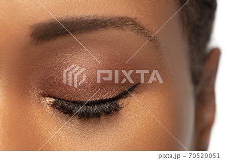 Portrait of beautiful african-american woman isolated on white studio background. Beauty, fashion, skincare, cosmetics concept. 70520051