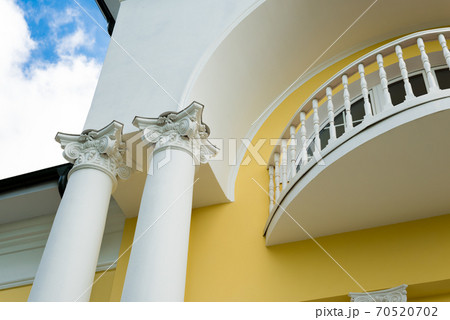 White building with columns in the classical style 70520702