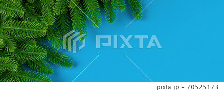 Top view Banner of colorful festive background made of fir tree branch. Christmas holiday concept with copy space Top view Banner of colorful festive background made of fir tree branch. Christmas holiday concept with copy space 70525173