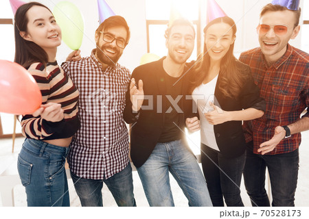 People have fun together and take a hurp photo.  70528173