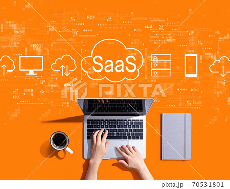 SaaS - software as a service concept with person using a laptop 70531801