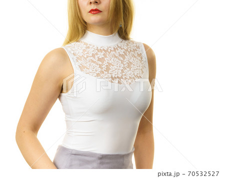 Woman wearing white top 70532527