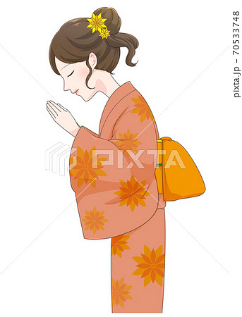 手を合わせ祈る着物姿の女性のイラスト素材