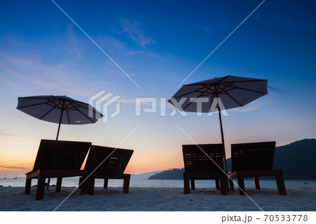 umbrella on beach under vivid colorful of sky 70533778