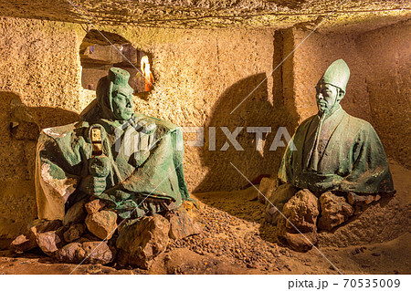 Images of traditional Japanese figures at Hanibe caves, Komatsu, Ishikawa Prefecture, Japan. 70535009