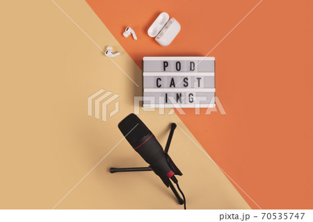 Blogging and podcasting concept with microphone and headphones Blogging and podcasting concept with microphone and headphones 70535747