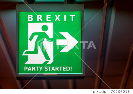 The emergency exit sign shows the direction of escape in case leave European Union.  70537018