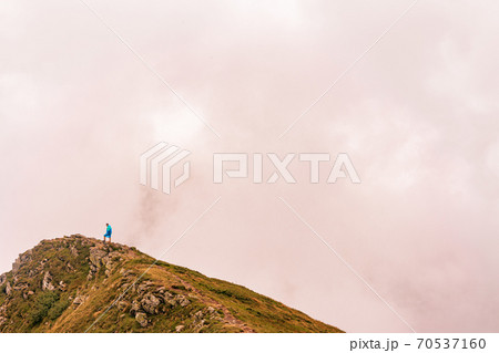 Montenegrin ridge in the clouds, Gutyn Tomnatyk mountain in the clouds, picturesque and fascinating magical landscapes from the mountain to the valleys. 70537160