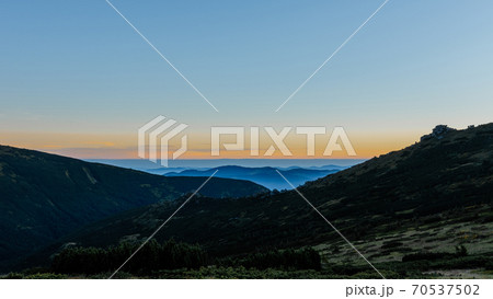 Sunrise in the Carpathians near Mount Pip Ivan, the saddle of Montenegro, a camping town in the saddle. Sunrise in the Carpathians near Mount Pip Ivan, the saddle of Montenegro, a camping town in the saddle. 70537502
